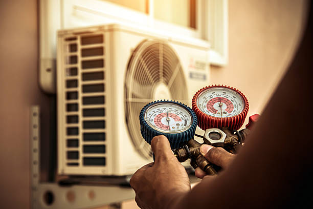 Professional Air Conditioning Service technician working in Cicero, NY